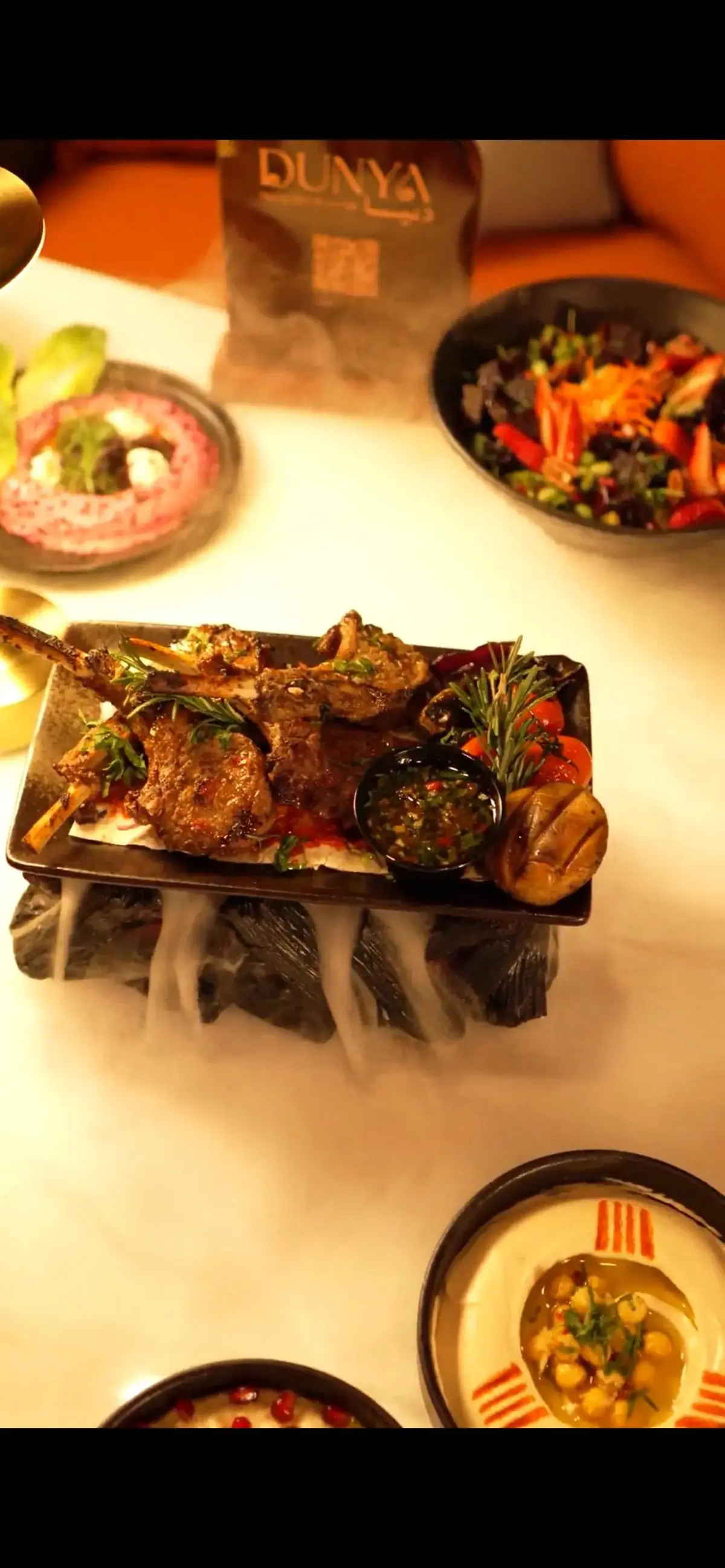 Dunya Lounge family platter with mixed grills and dry ice presentation